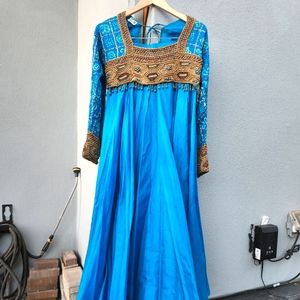Women's three piece silk lengha set in tourquoise blue by Raaz size small